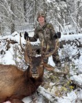 Easton poses with their bull elk.