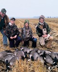 Grandpa and the boys on a successful goose hunting trip.